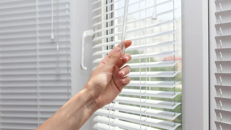 Why do Americans use blinds instead of curtains?